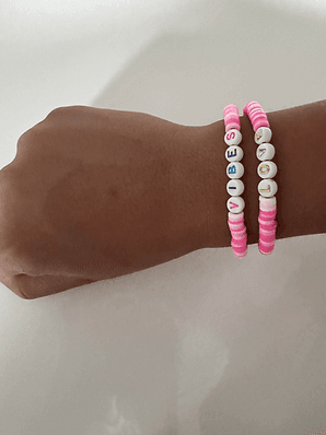 Two bracelets on a hand